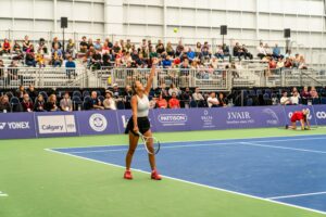 Teah Chavez playing tennis at the Calgary National Bank Challenger